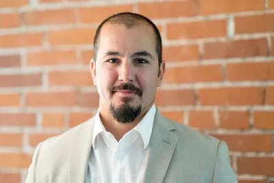 Aaron Searles-Montaño, Director, he/him